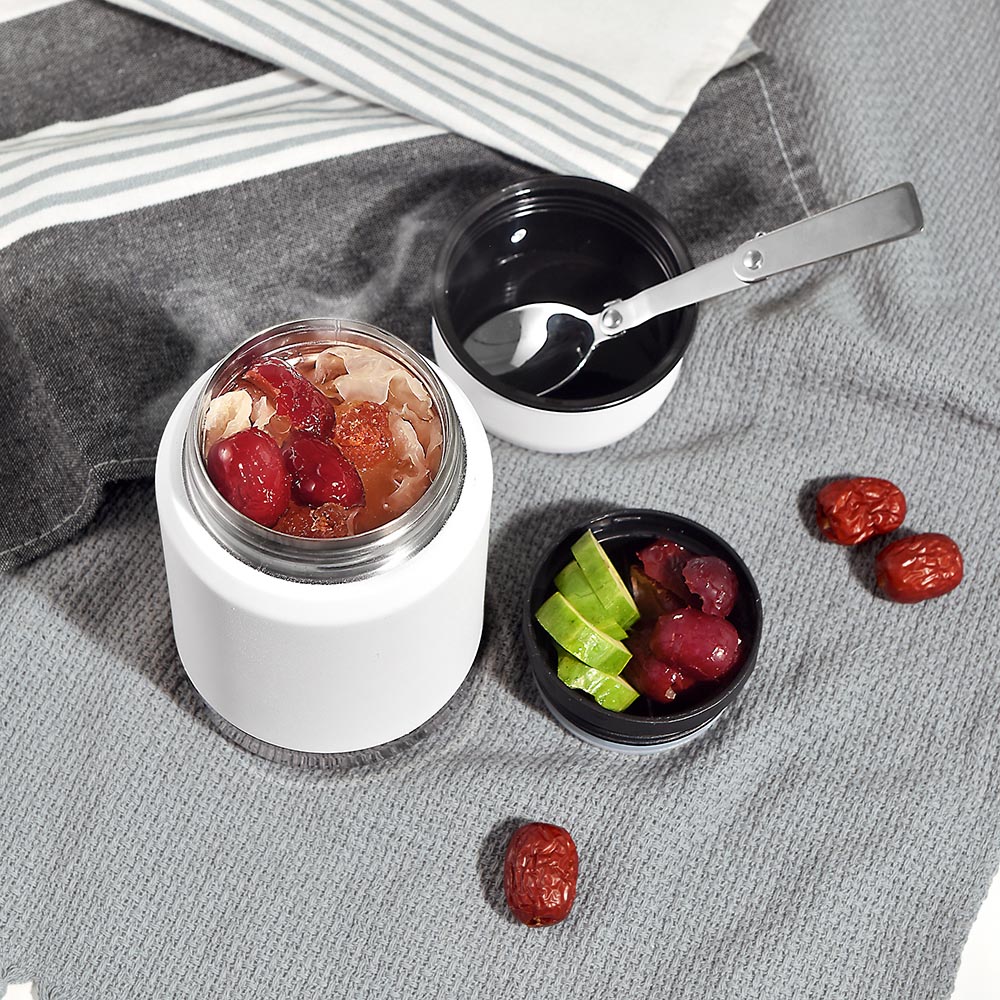 thermos food jar with spoon with food inside