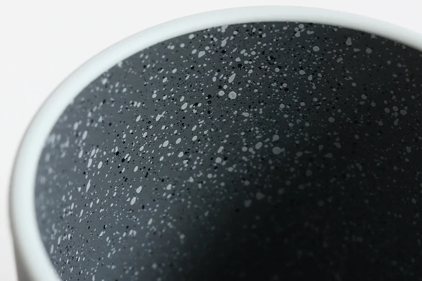 Close-up of speckled stoneware-inspired interior finish on recycled PET tumbler