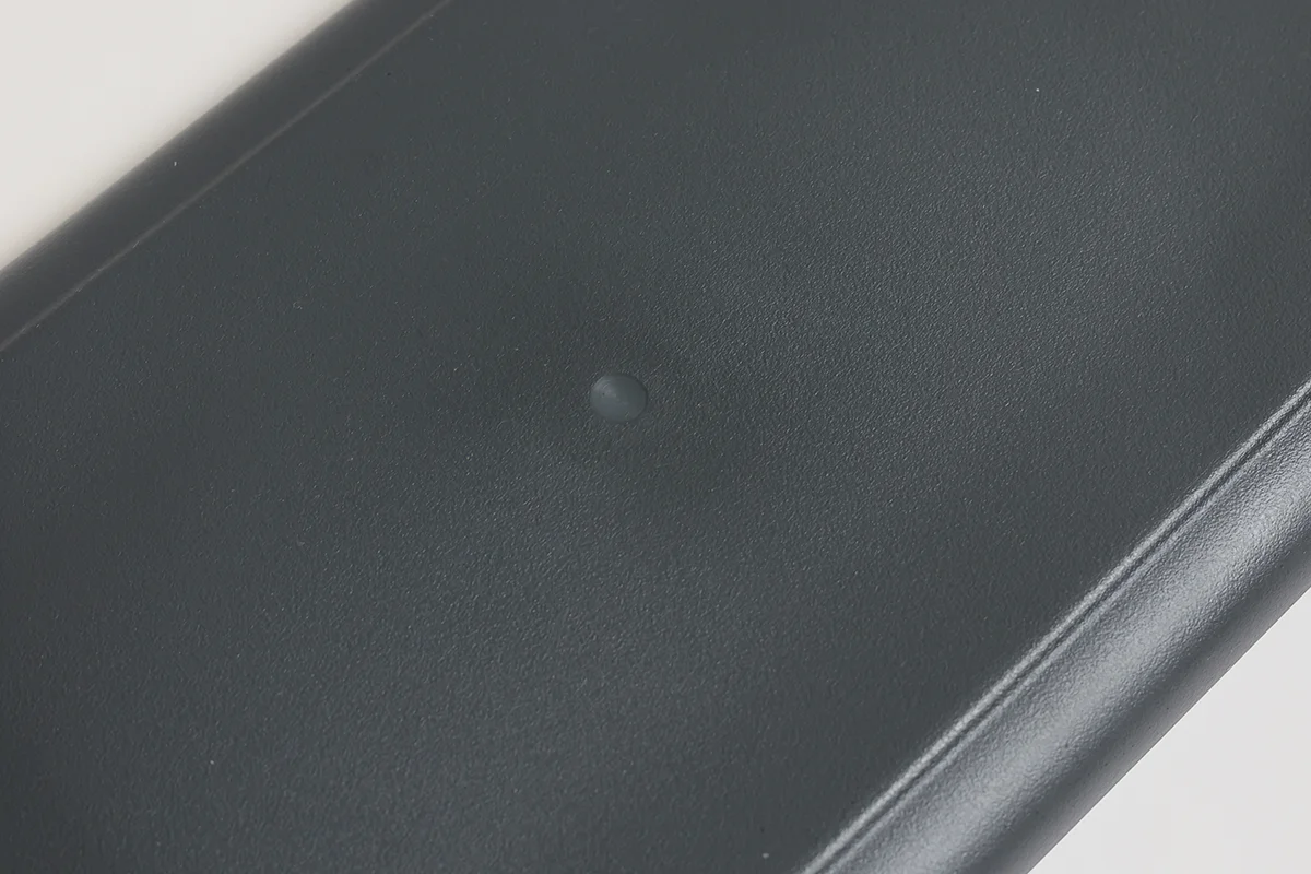 Bottom center detail of molded recycled PET oval serving tray