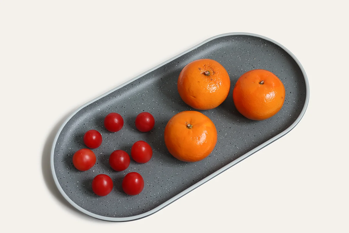 Stoneware-inspired recycled PET oval serving tray for snacks fruit and food presentation