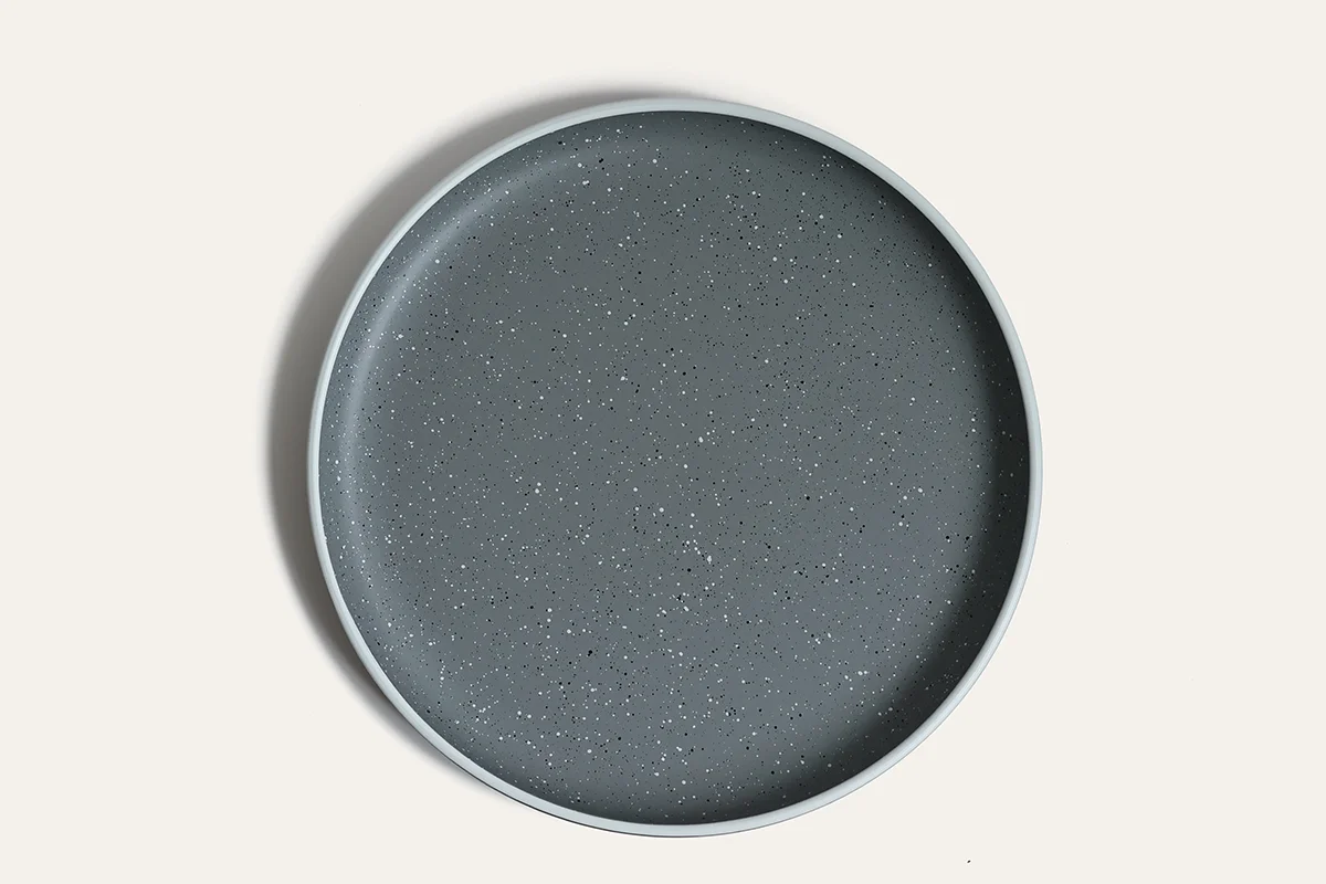Top view of stoneware-inspired recycled PET dinner plate
