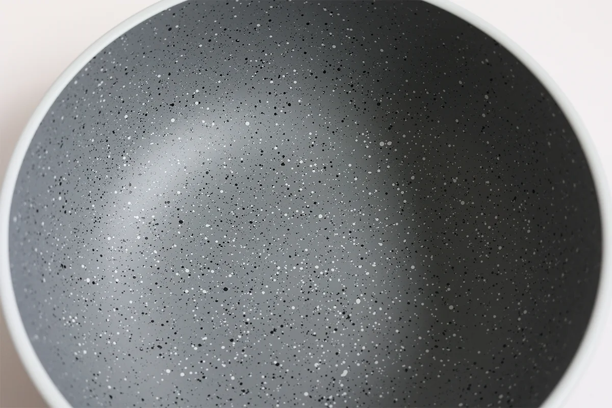 Close-up of speckled interior surface on stoneware-inspired recycled PET bowl