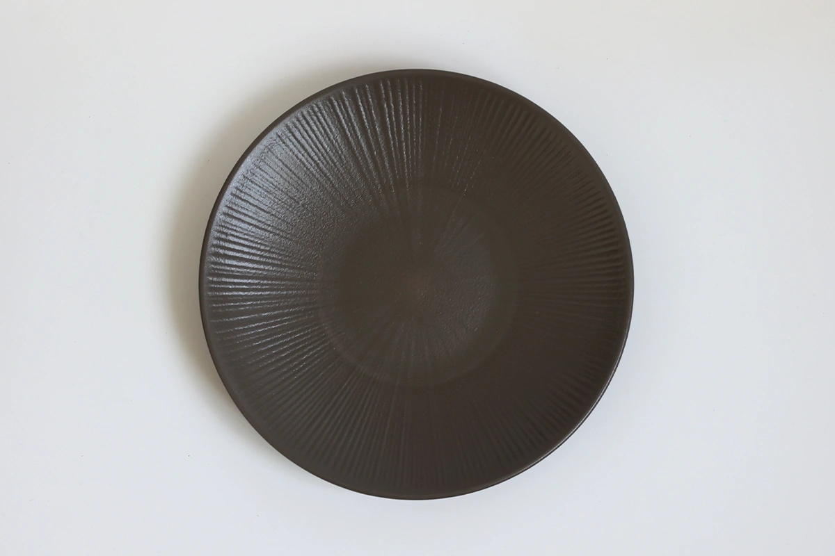 Overhead View of Charcoal Gray Pasta Plate with Radiant Texture