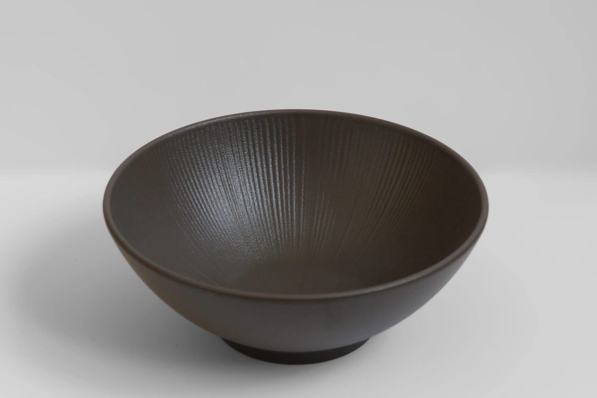 Close-Up of Radiant Texture Pattern Inside Charcoal Gray Bowl